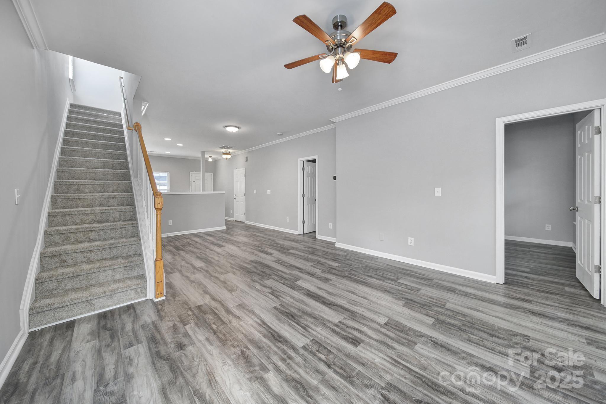 13719 Singleleaf Lane Charlotte, NC 28278 - Photo 15 of 42 wooden floor in an empty room with a window