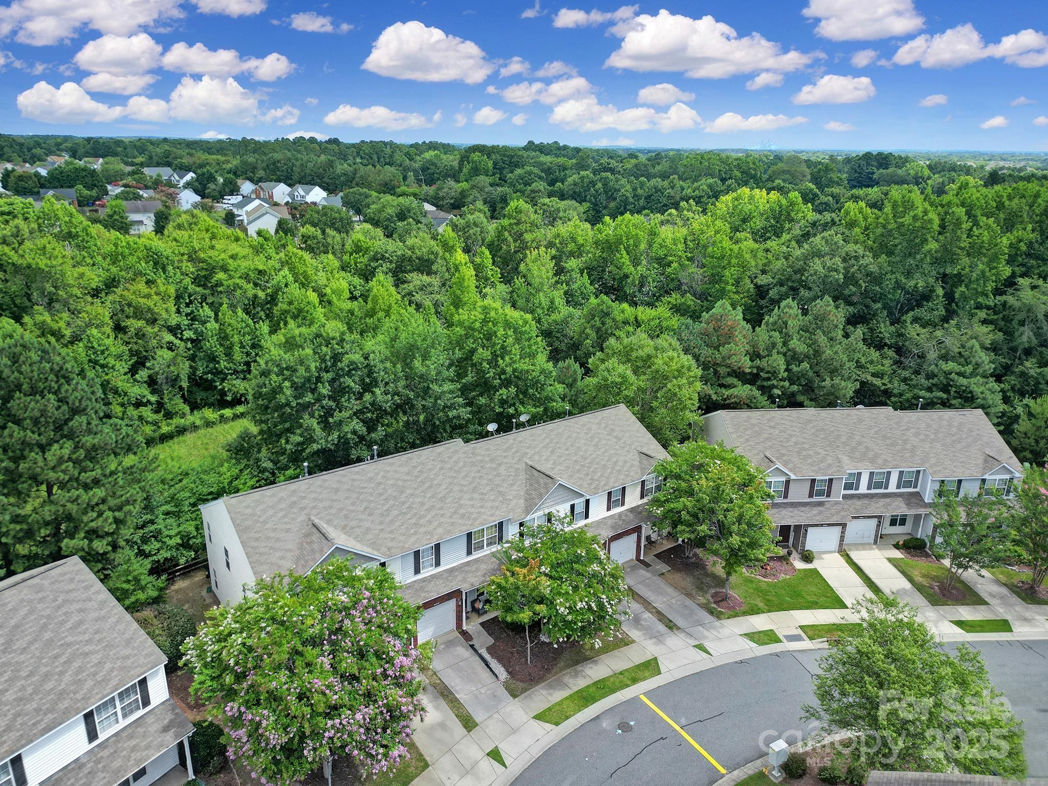 13719 Singleleaf Lane Charlotte, NC 28278 - Photo 37 of 42 an aerial view of a house with a garden