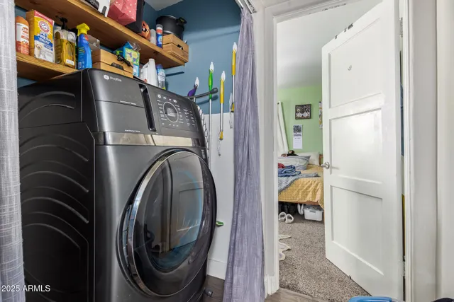 a utility room with dryer and washer
