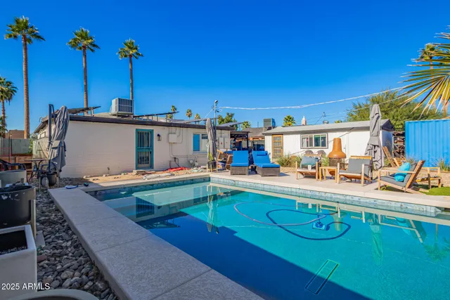 a view of a kitchen with a sitting area