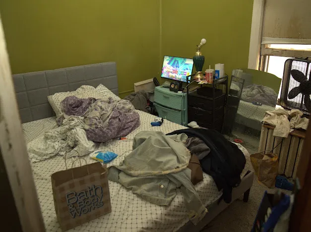 a balcony with table and chairs