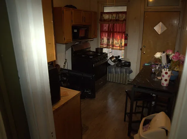 a kitchen with a stove and a microwave