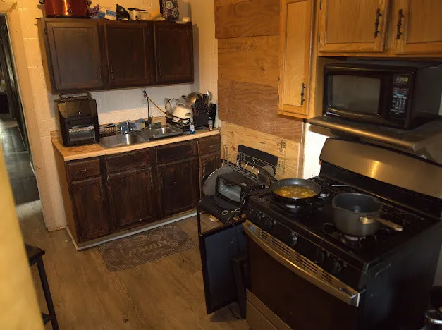 a view of a window with wooden floor