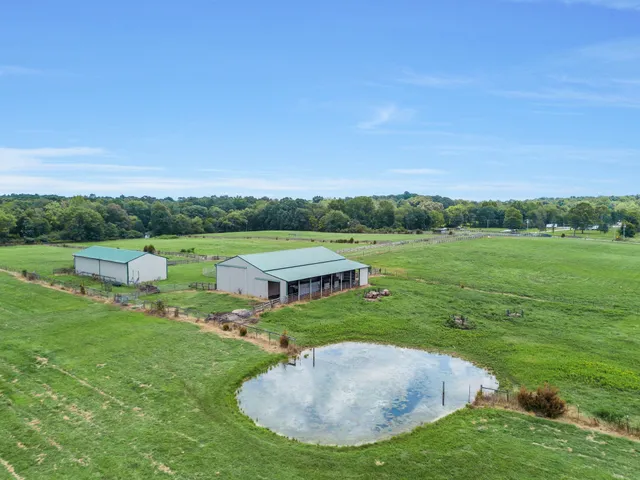 a view of a golf course with a lake