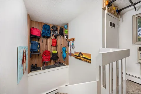 a view of a entryway with storage and utility