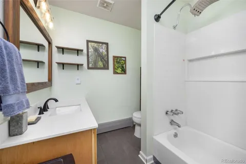 a bathroom with a sink and a bathtub