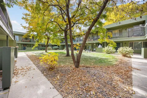 a view of a yard with a house