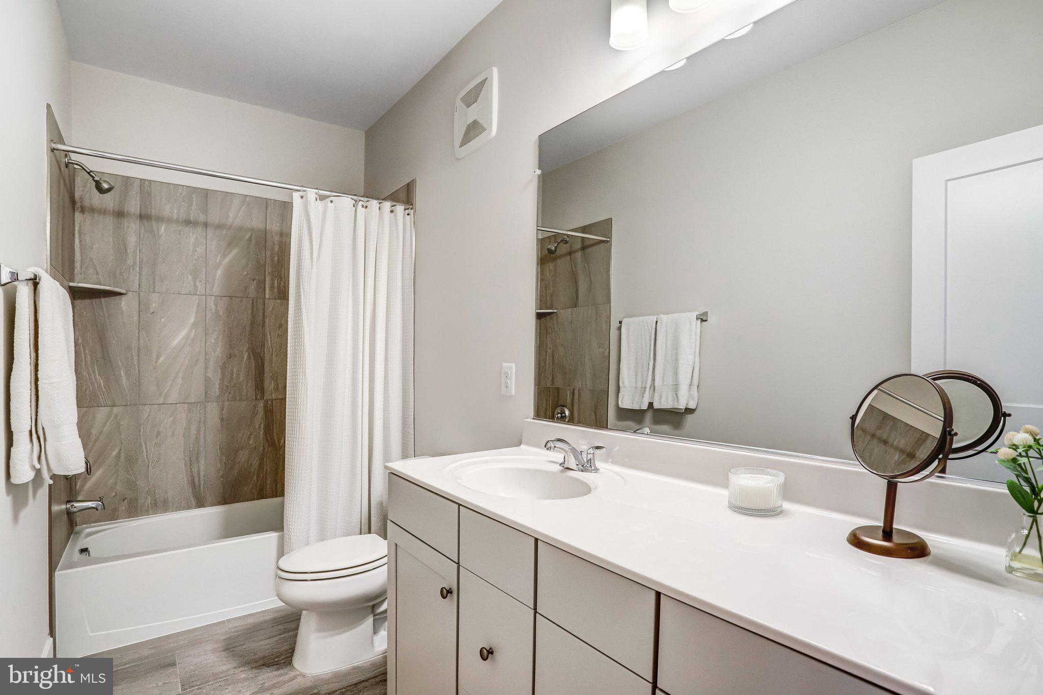 1662 Bandit Loop, Unit 3B Reston, VA 20190 - Photo 35 of 47 Bright Main Hall Bath