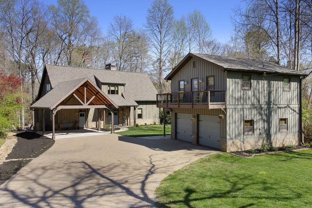 2287 Nix Bridge Road Dawsonville, GA 30534 - Photo 1 of 1 New lake home and detached garage with upstairs two bedroom apartment. Both fully furnished with quality touch.
