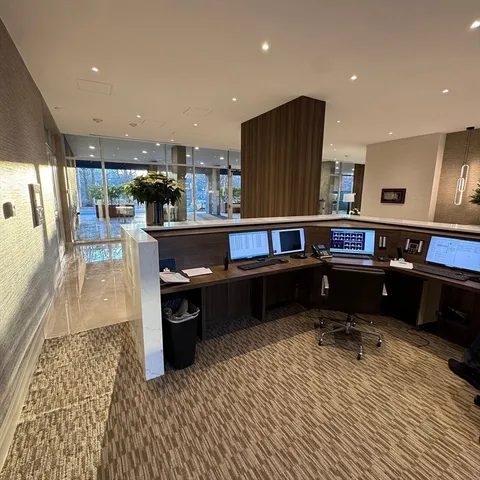 a balcony with tall buildings