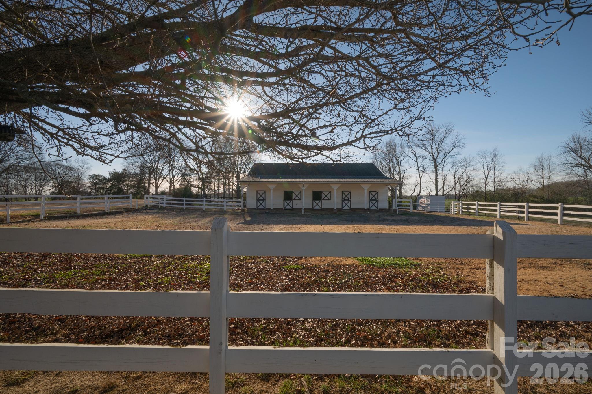 5432 Highway 218 Monroe, NC 28110 - Photo 30 of 48 a view of a yard with wooden fence