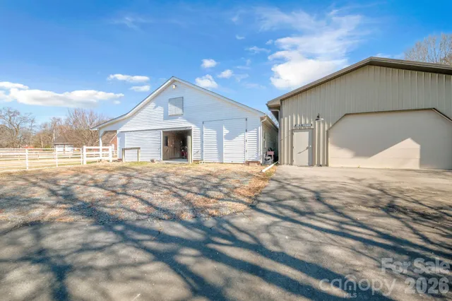 a house with trees in the background