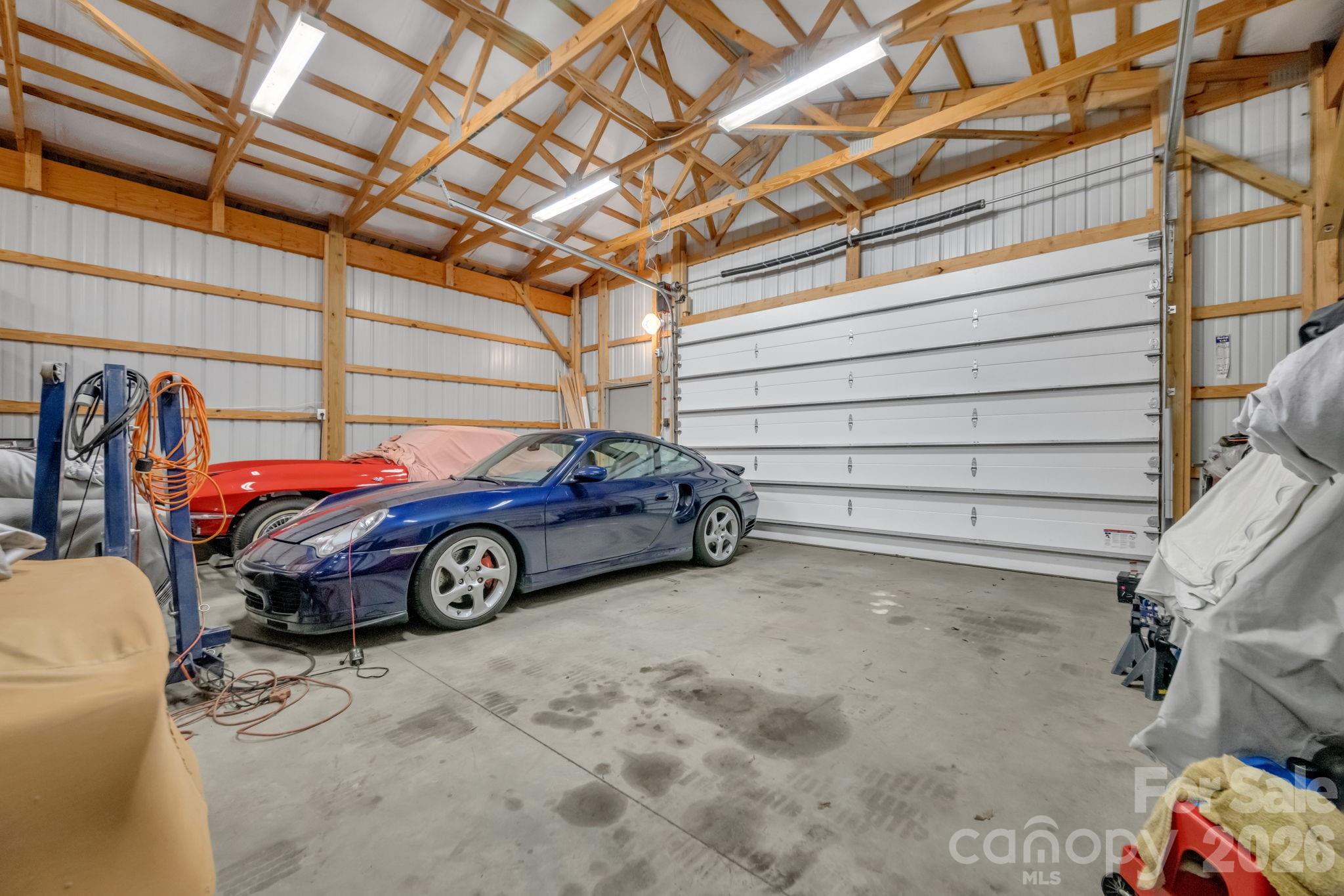 5432 Highway 218 Monroe, NC 28110 - Photo 40 of 48 a car parked in garage