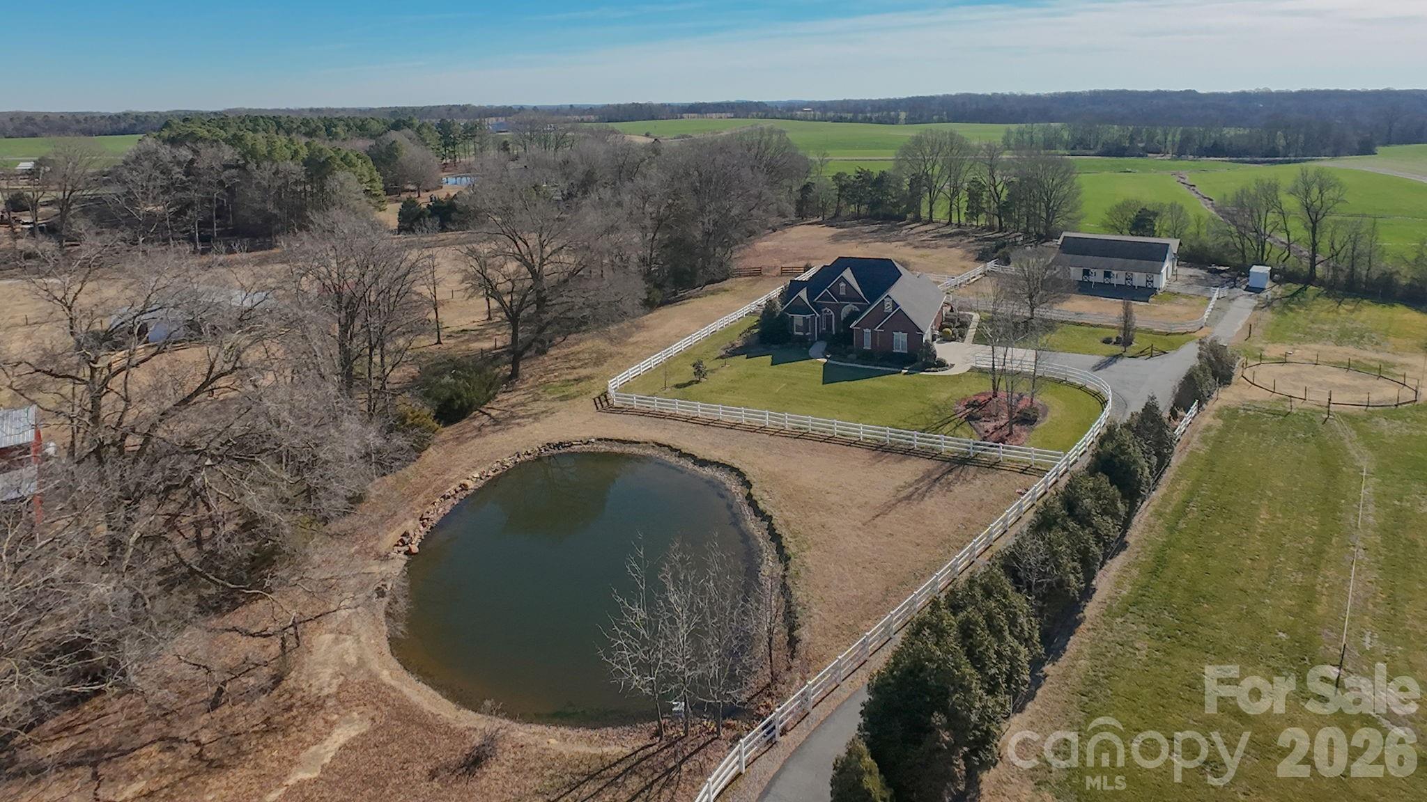 5432 Highway 218 Monroe, NC 28110 - Photo 41 of 48 a view of a swimming pool with a patio