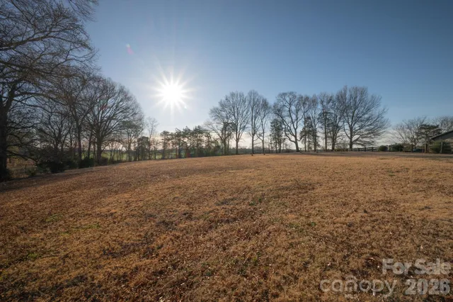 a view of swimming pool with a patio