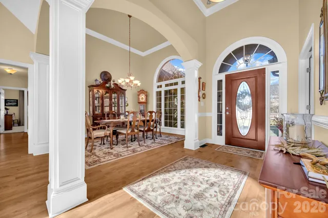 a view of a livingroom with furniture and a fireplace