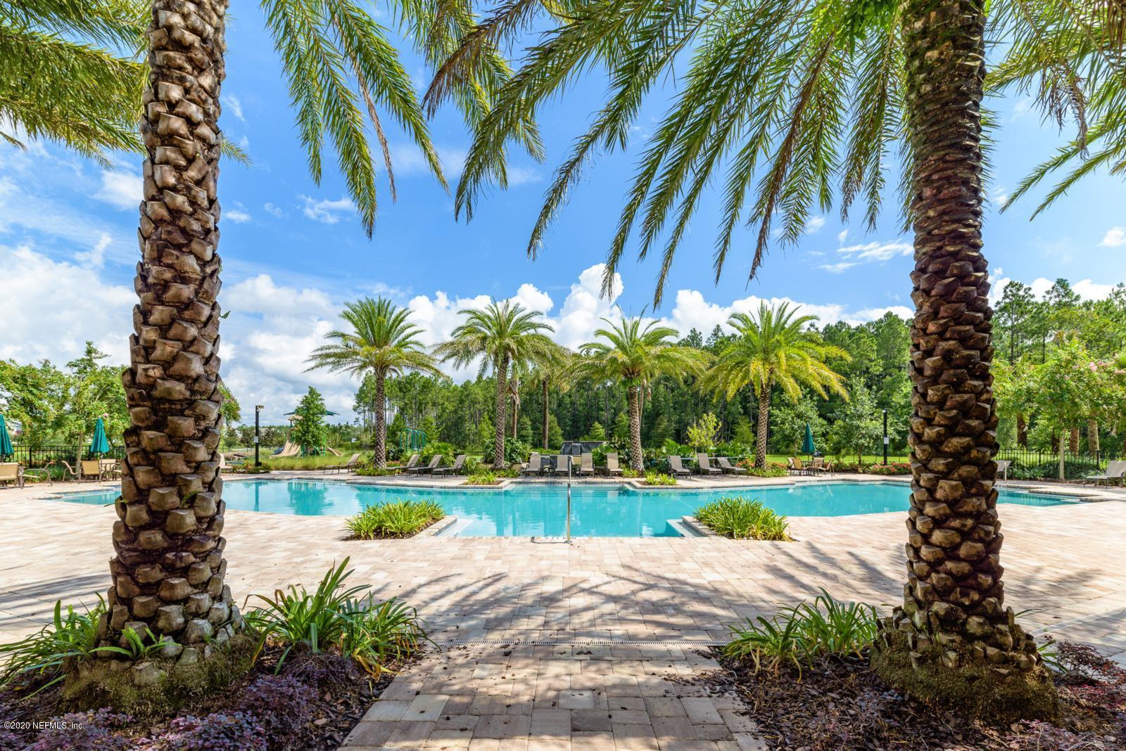 235 Brybar Drive St. Augustine, FL 32095 - Photo 11 of 11 a front view of a house with garden