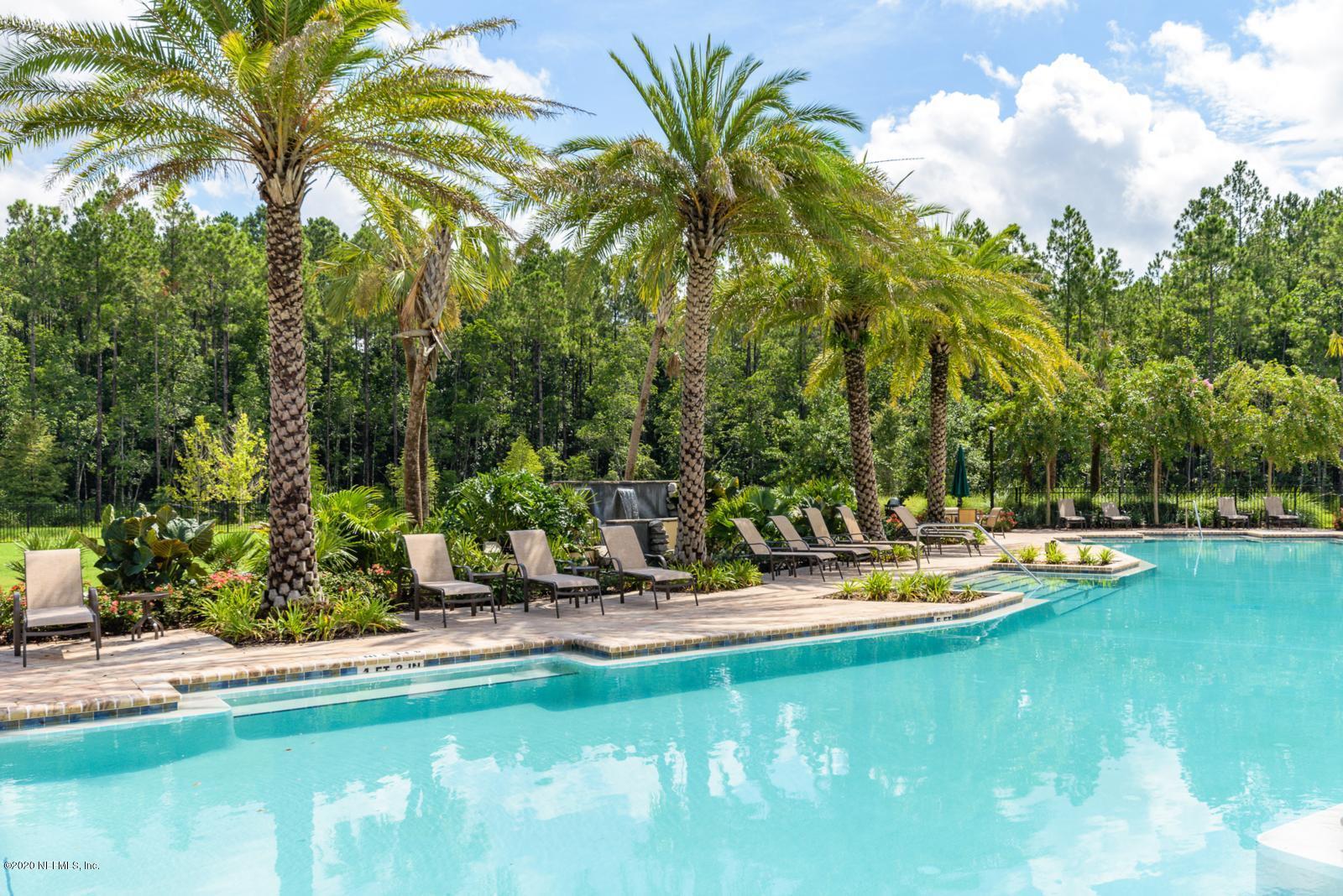235 Brybar Drive St. Augustine, FL 32095 - Photo 10 of 11 a view of a swimming pool with chairs