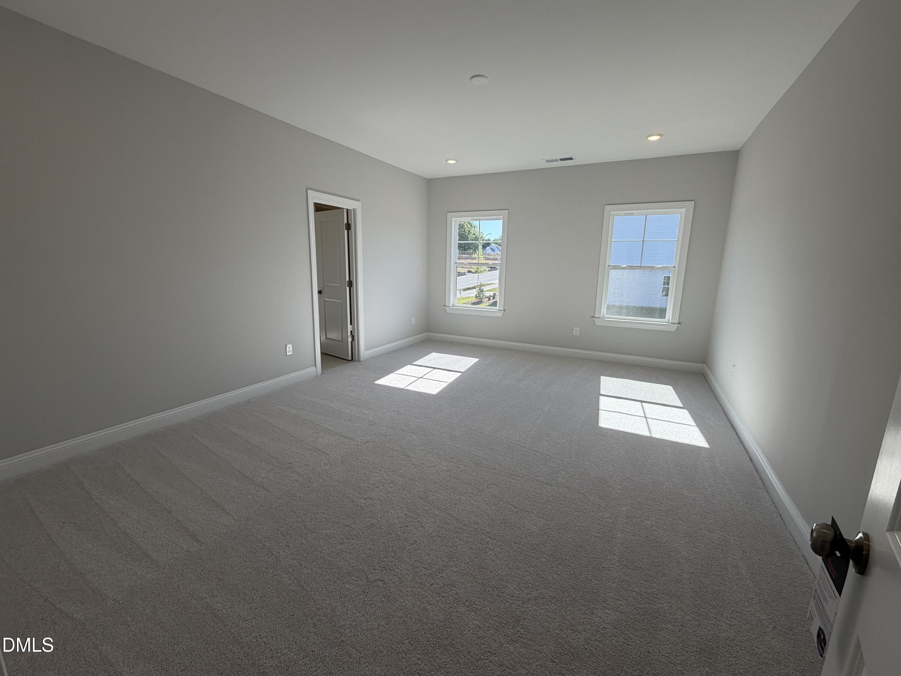 3016 Sandy Bluff Road Raleigh, NC 27616 - Photo 19 of 34 an empty room with windows