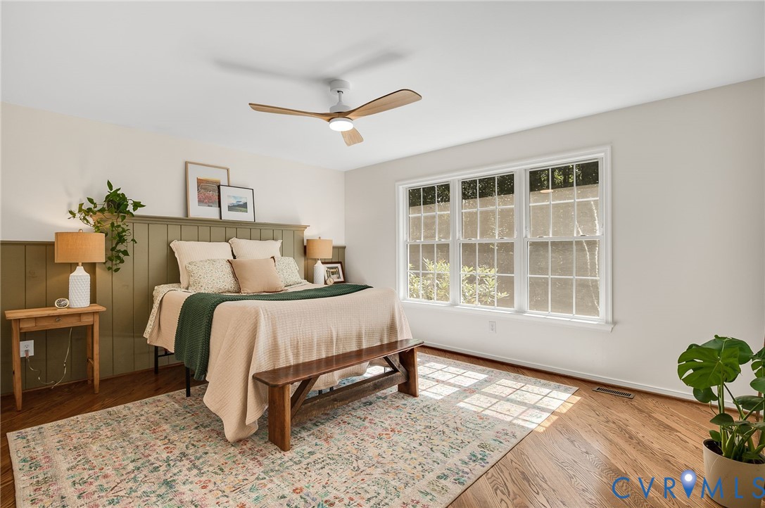 2620 Academy Road Powhatan, VA 23139 - Photo 11 of 49 a bedroom with a bed and wooden floor