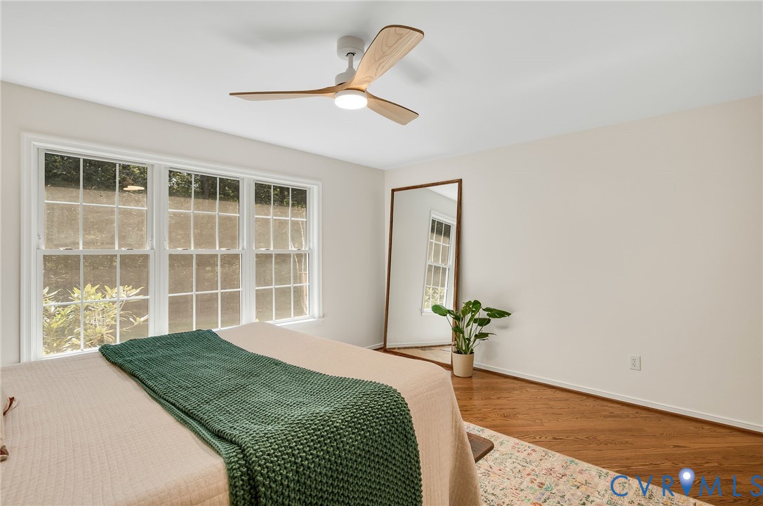 2620 Academy Road Powhatan, VA 23139 - Photo 12 of 49 a bedroom with a bed and a window