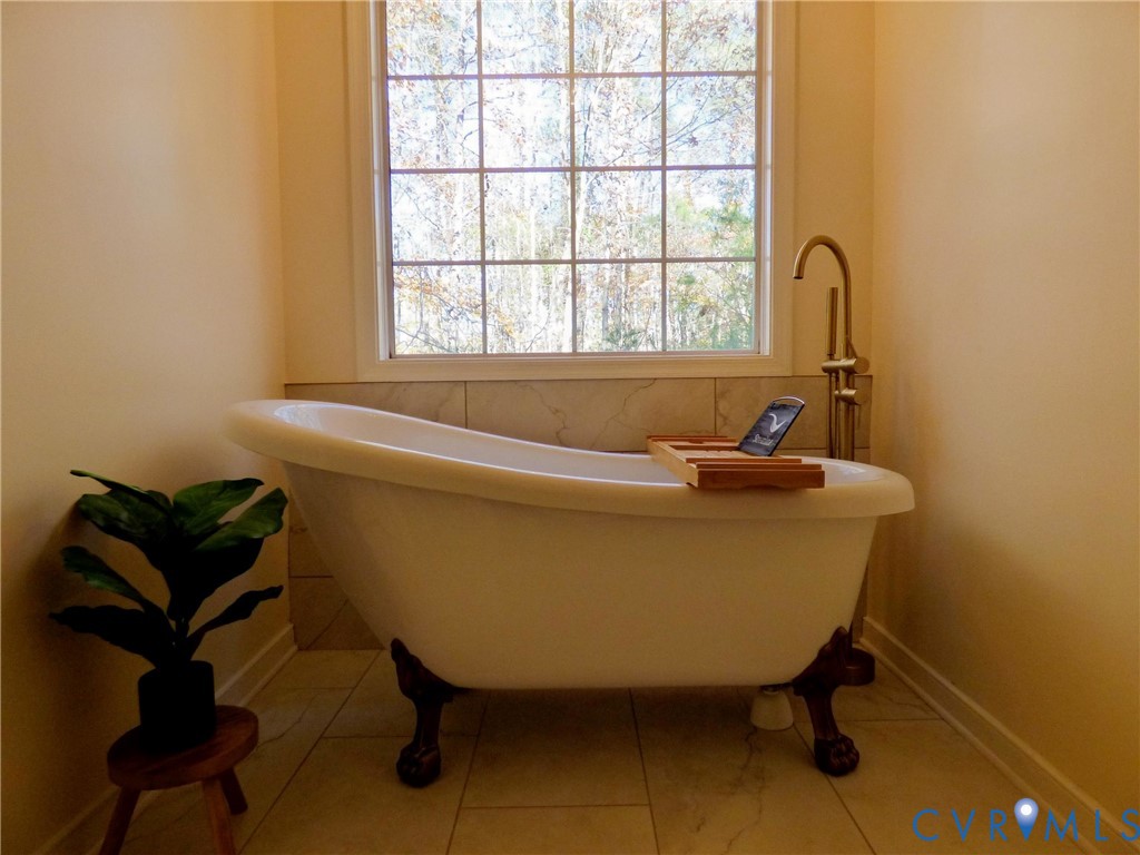 2620 Academy Road Powhatan, VA 23139 - Photo 17 of 49 a bathroom with a sink and a window