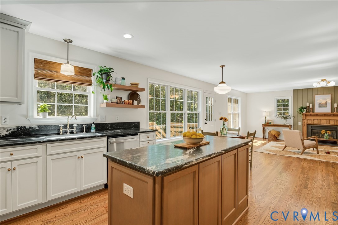 2620 Academy Road Powhatan, VA 23139 - Photo 22 of 49 a kitchen with granite countertop a sink and cabinets