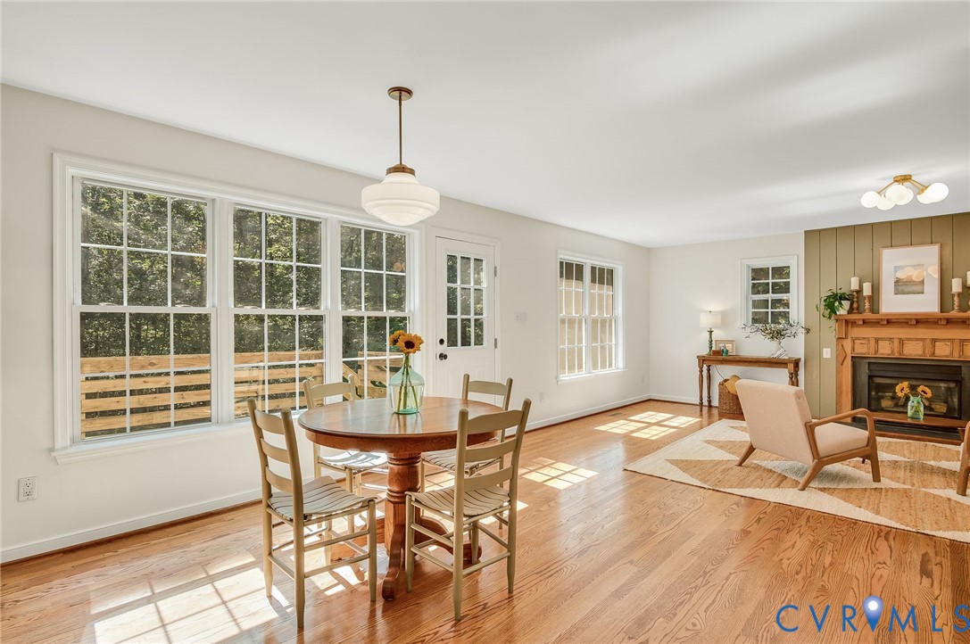 2620 Academy Road Powhatan, VA 23139 - Photo 28 of 49 a view of a dining room with furniture window and wooden floor