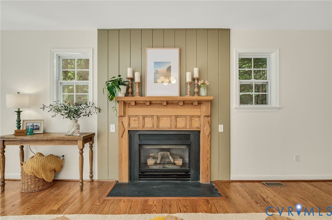 2620 Academy Road Powhatan, VA 23139 - Photo 31 of 49 a living room with furniture and a fireplace