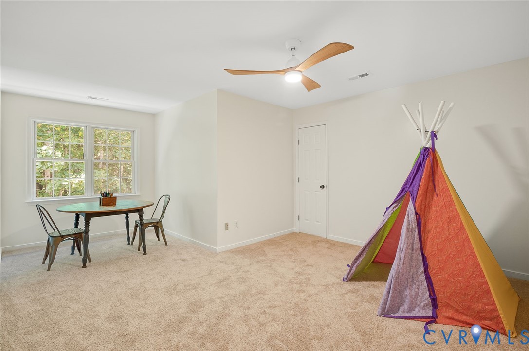 2620 Academy Road Powhatan, VA 23139 - Photo 36 of 49 a view of a room with furniture and wooden floor