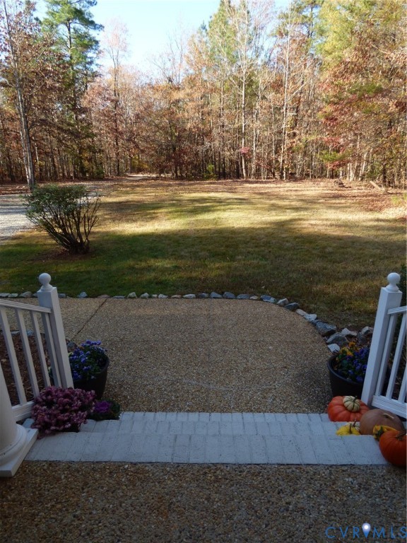 2620 Academy Road Powhatan, VA 23139 - Photo 45 of 49 a view of a swimming pool with an outdoor space and seating area