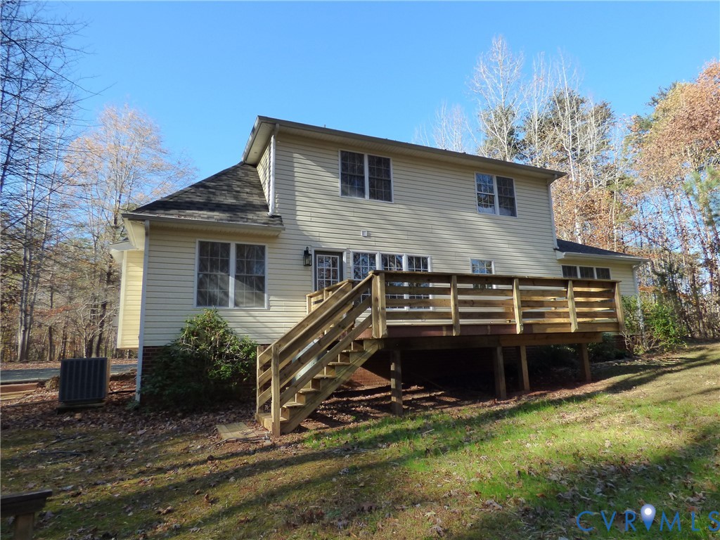 2620 Academy Road Powhatan, VA 23139 - Photo 6 of 49 a view of a house with backyard and sitting area