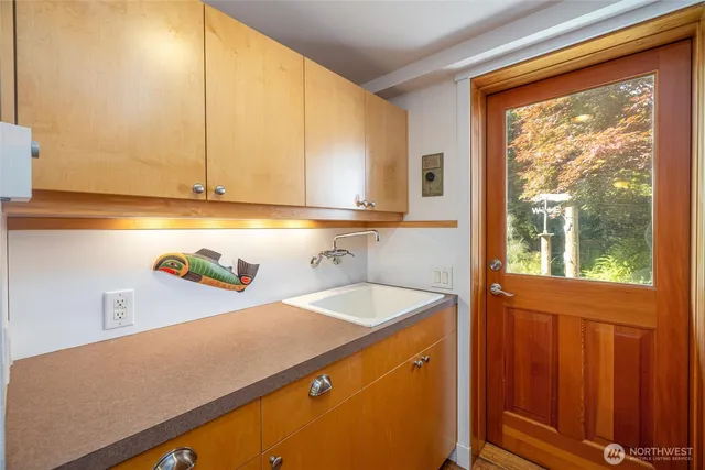 a room with a sink and a cabinet
