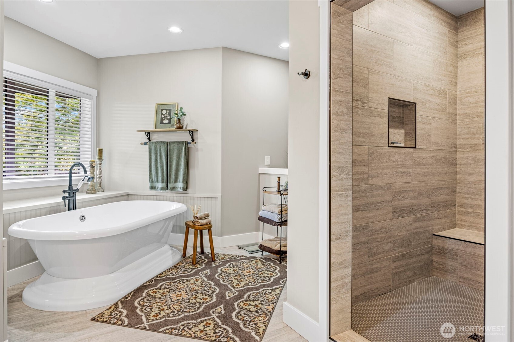 6591 Northeast North Shore Road Belfair, WA 98528 - Photo 26 of 37 a spacious bathroom with a bathtub and a shower