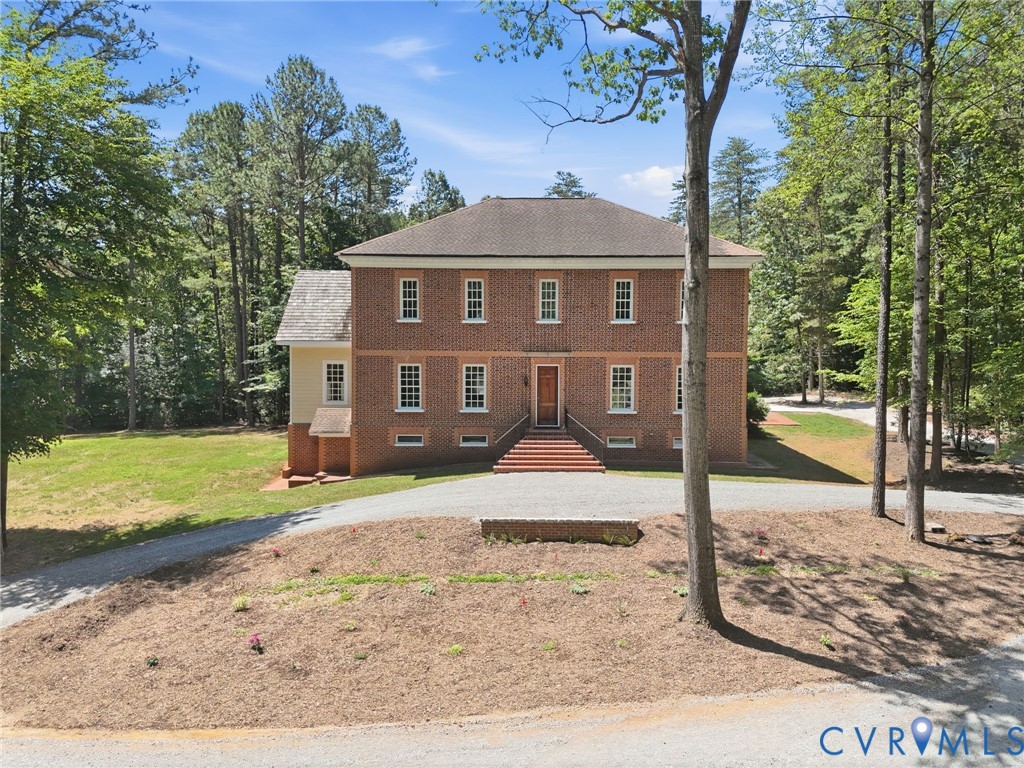 13173 Scotchtown Road Beaverdam, VA 23015 - Photo 62 of 65 a front view of a house with a yard