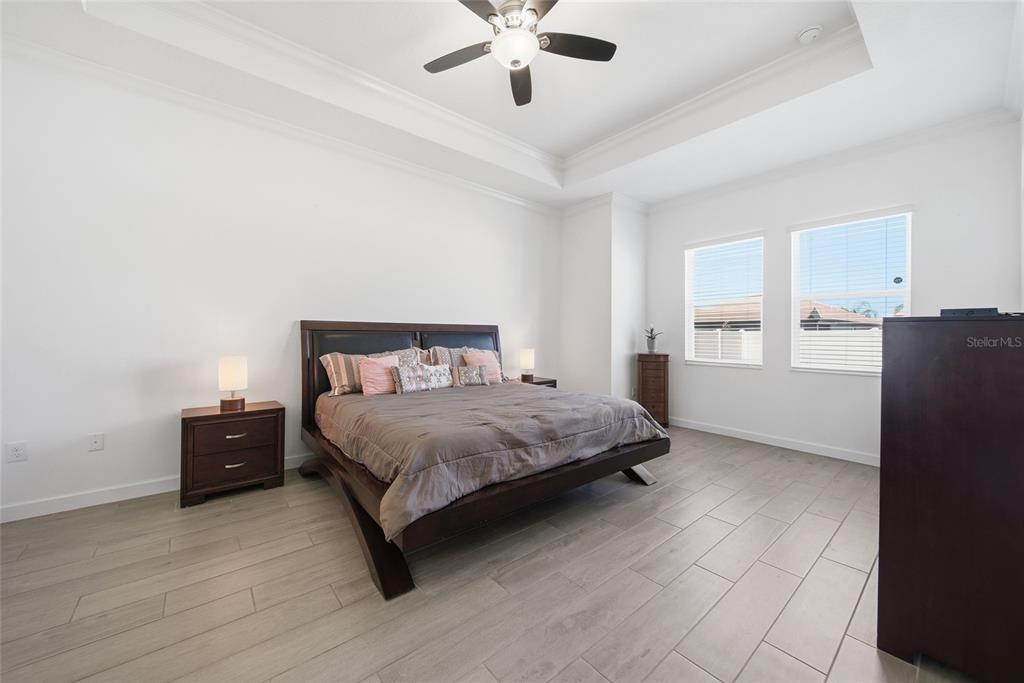 17301 Scuba Crest Street Wimauma, FL 33598 - Photo 10 of 37 a bedroom with a bed and window