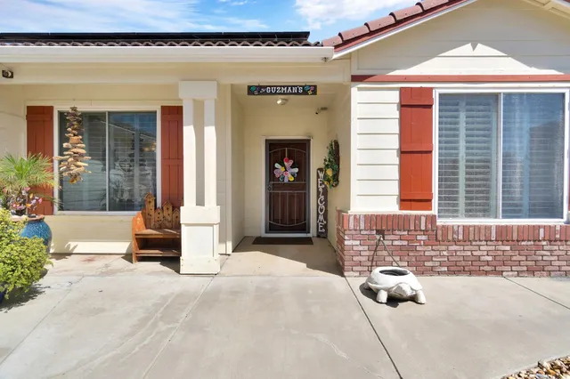 a front view of a house with a outdoor space