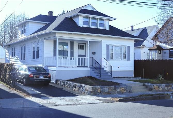 447 Exeter Street Bridgeport, CT 06606 - Photo 1 of 1 a front view of a house with a yard