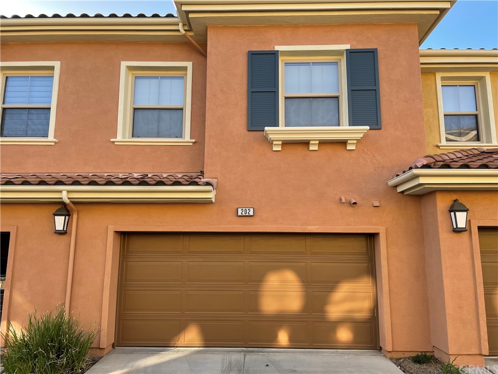 202 Wild Lilac Irvine, CA 92620 - Photo 10 of 10 a view of a kitchen with a sink