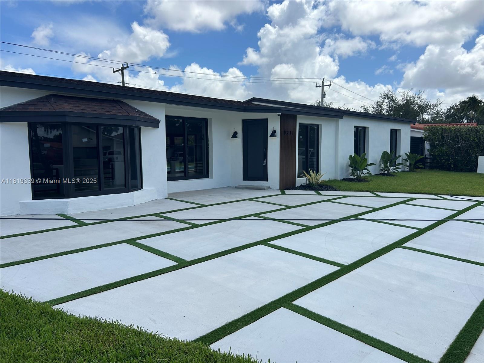 a yellow house with outdoor space