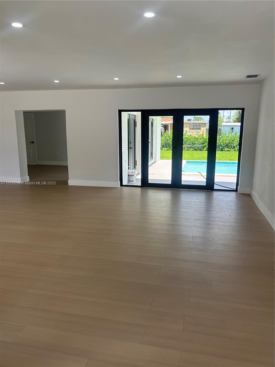 Westchester Miami, FL 33165 - Photo 20 of 25 a view of lot of room with window and floor to ceiling window