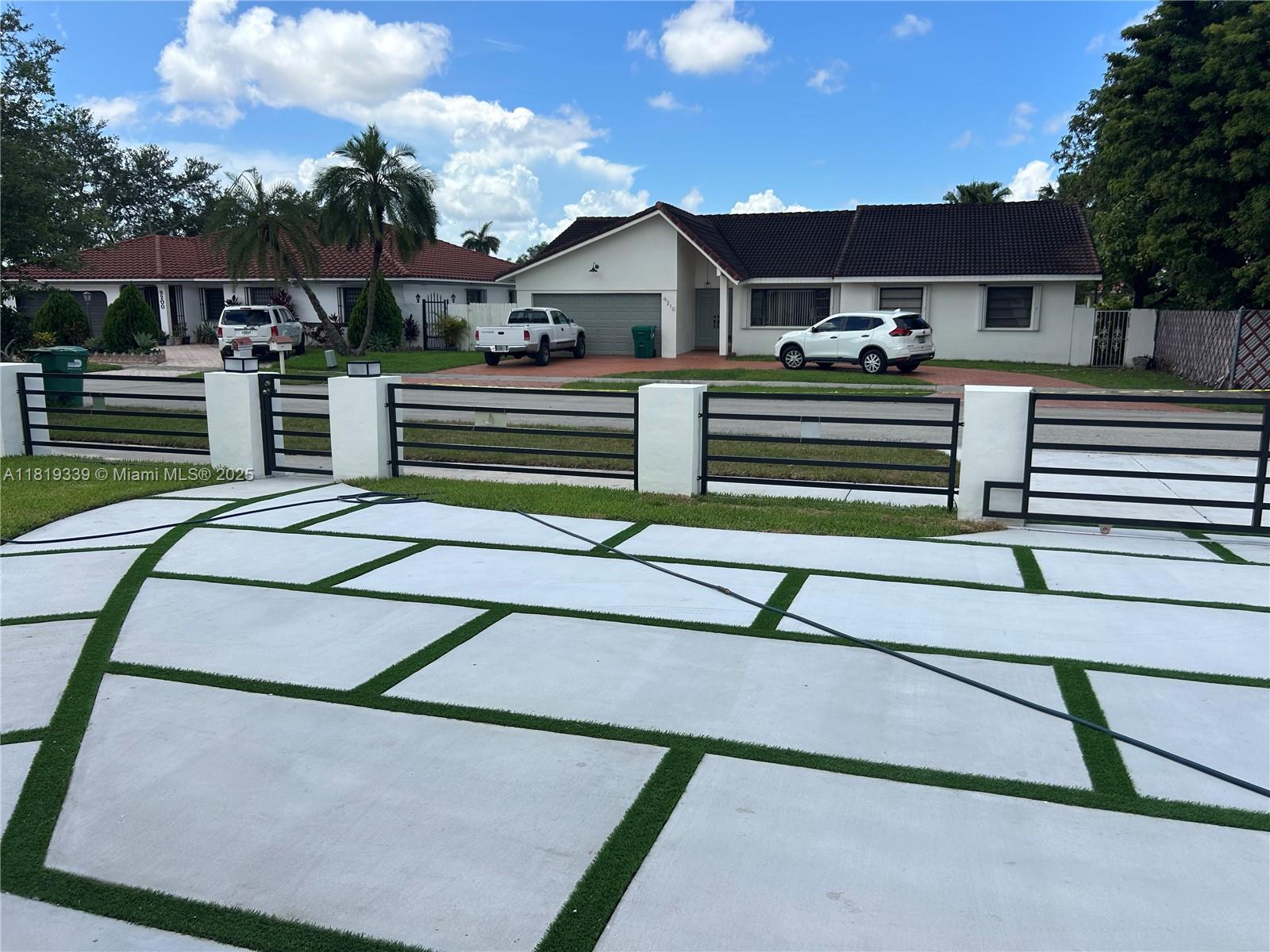 Westchester Miami, FL 33165 - Photo 25 of 25 a front view of a house with a yard