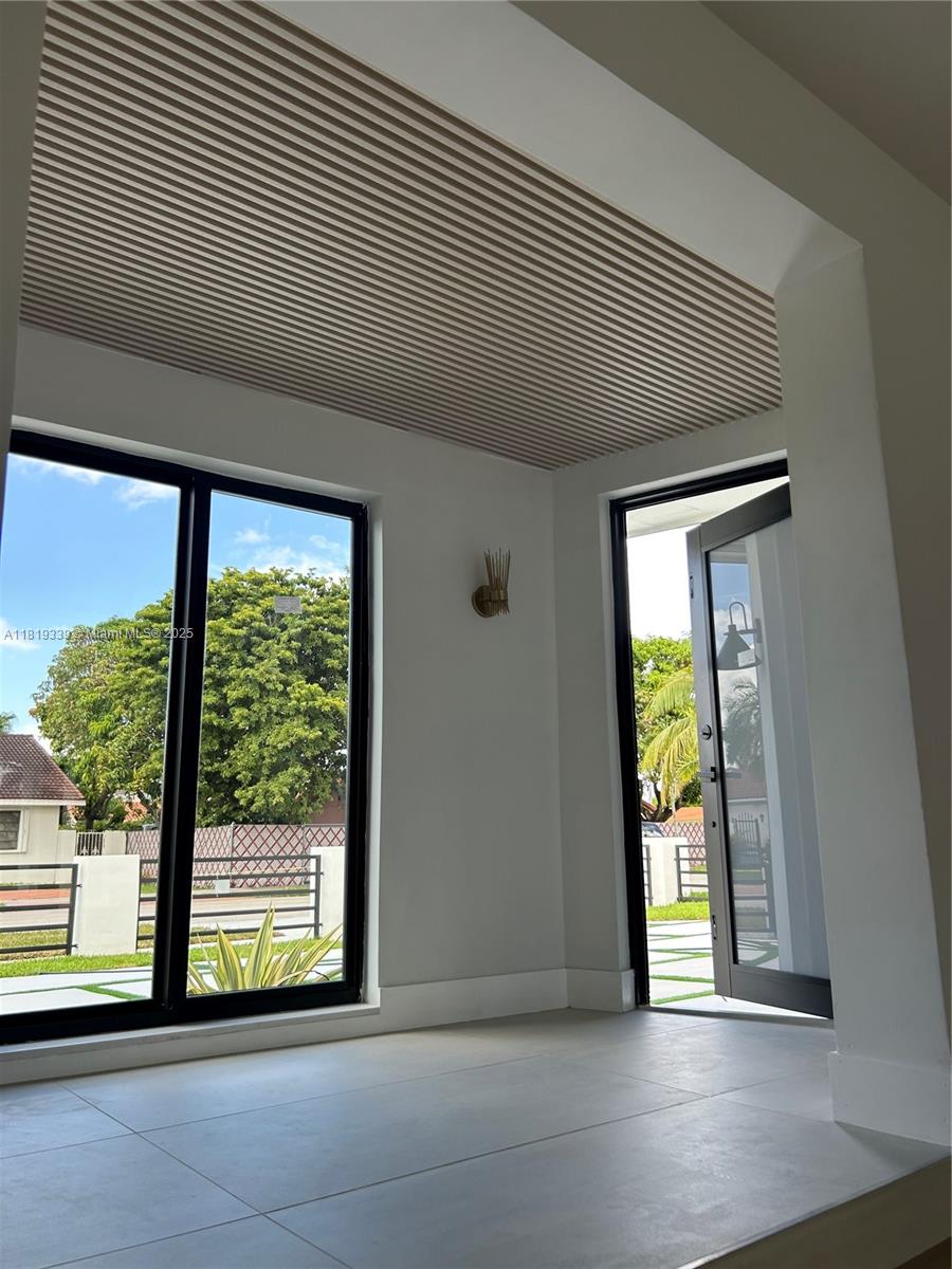 Westchester Miami, FL 33165 - Photo 9 of 25 a view of an empty room with a balcony