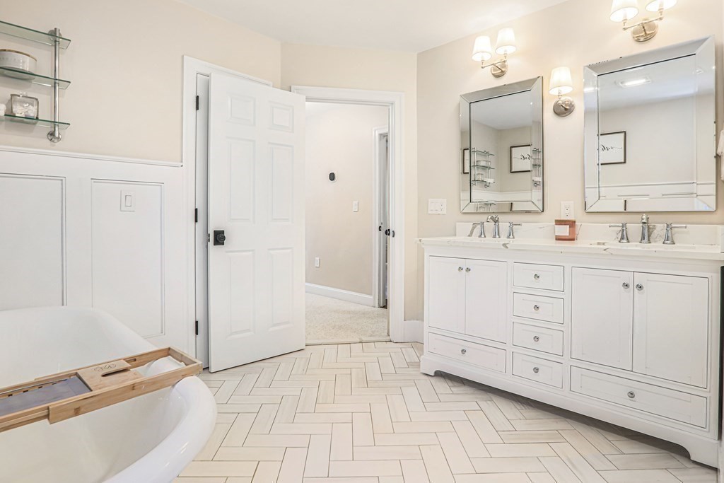 6 Kate's Lane Boxford, MA 01921 - Photo 22 of 36 a spacious bathroom with a double vanity sink a mirror and a shower