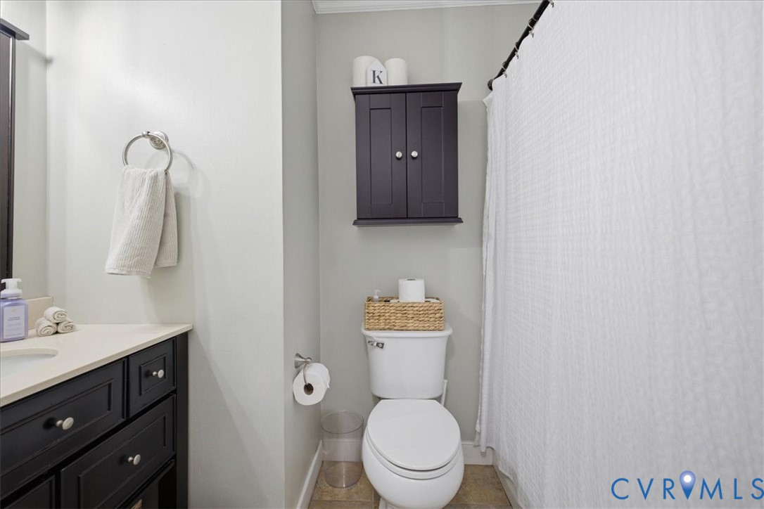 7900 Valencia Road Chesterfield, VA 23832 - Photo 20 of 37 Bathroom featuring a dark wood-finish vanity with