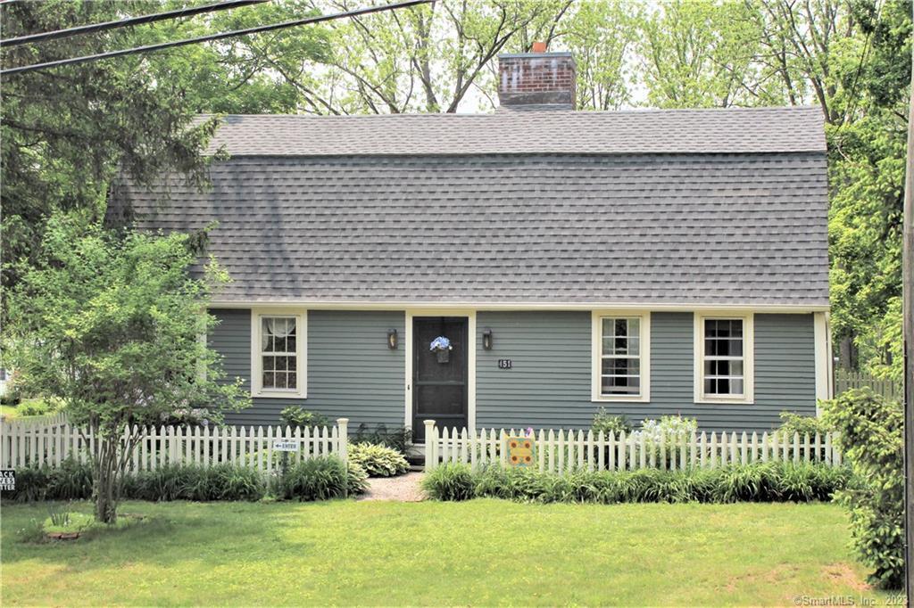 451 South Main Street Suffield, CT 06078 - Photo 1 of 1 a front view of a house with a garden