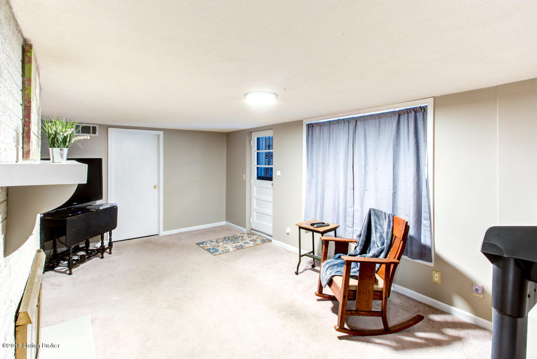 7707 Crestline Road Louisville, KY 40214 - Photo 21 of 29 FAMILY ROOM w/FIREPLACE in basement