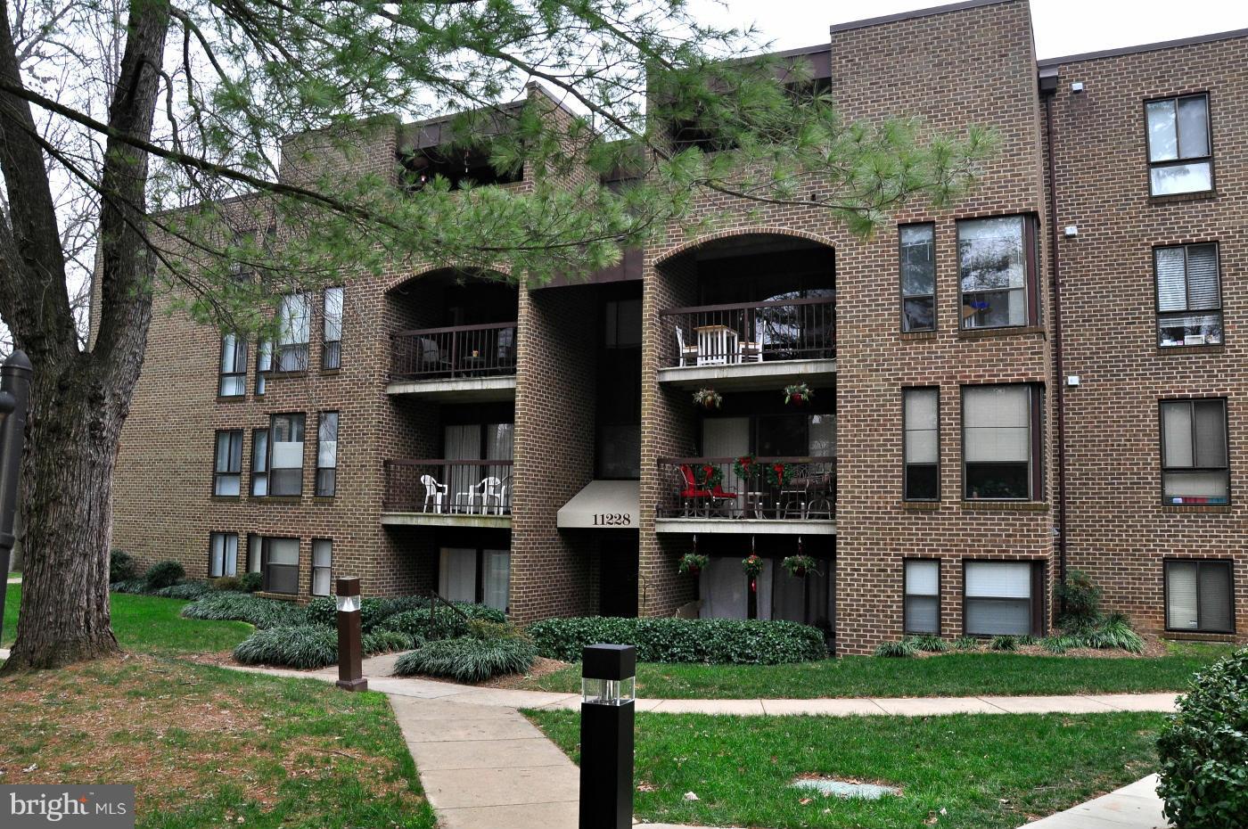 11228 Chestnut Grove Square, Unit 329 Reston, VA 20190 - Photo 1 of 27 Exterior (Front)