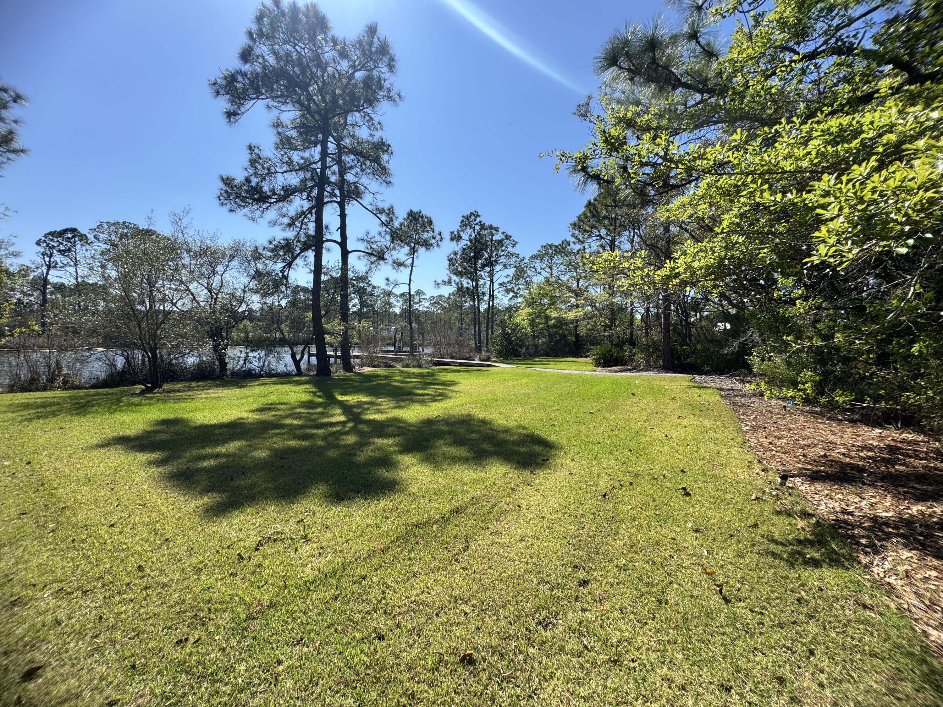 102 Churchill Drive Santa Rosa Beach, FL 32459 - Photo 24 of 89 Waterfront Backyard