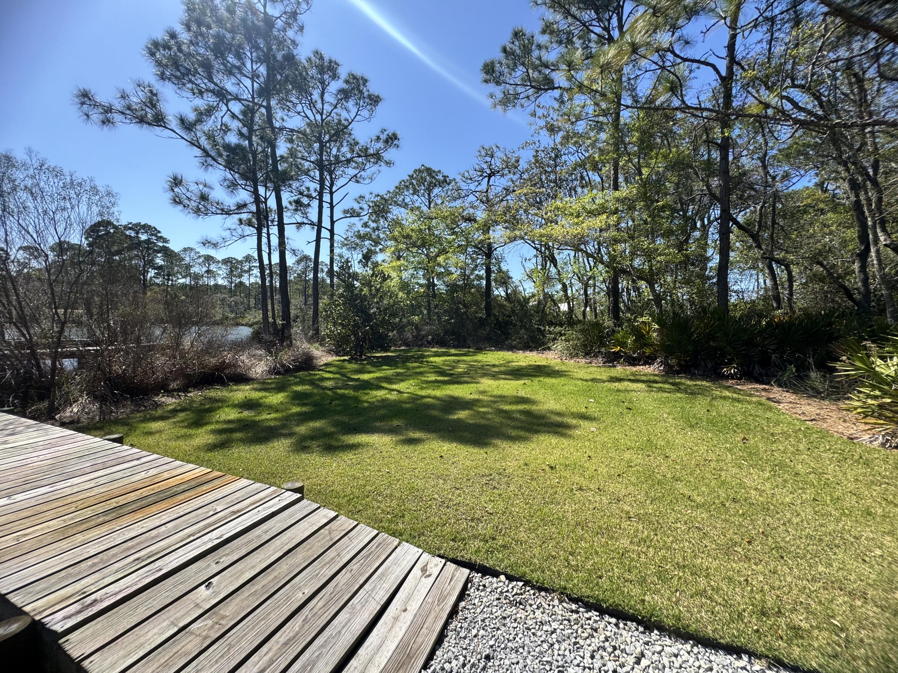 102 Churchill Drive Santa Rosa Beach, FL 32459 - Photo 25 of 89 Waterfront Backyard